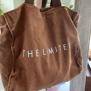 THE LIMITED OVERNIGHT TOTE BROWN W LIGHT BLUE LETTERING, SILKY STRAPS, SPACIOUS